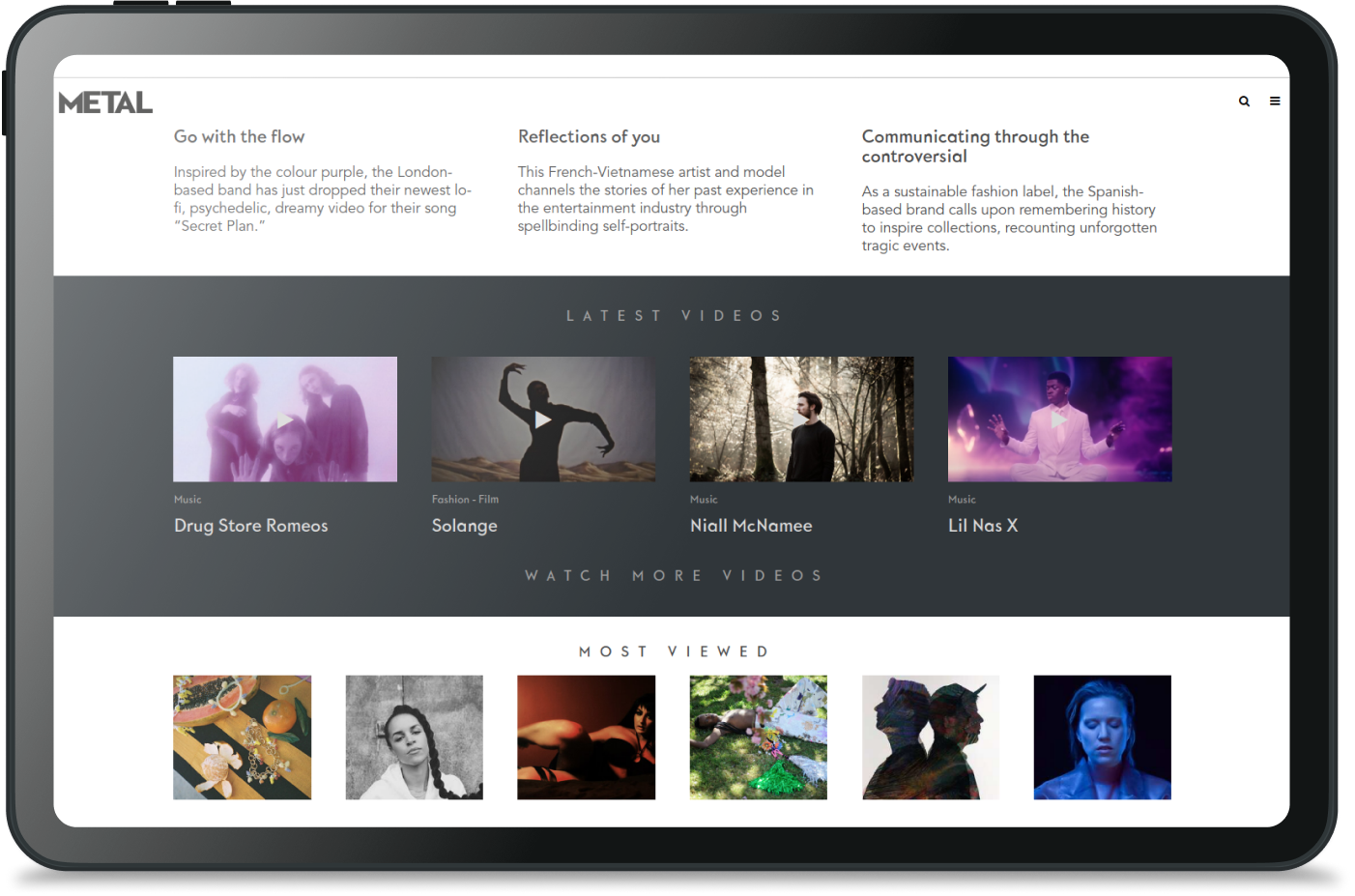 Metal Magazine website tablet mockup with latest and most viewed videos